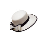 “La Visera” is a classic elegant hat for all women. Handmade out of natural Toquilla Palm Tree. A exclusive design from El Galpón this beautiful hat comes in tree colors to choose. We ship to all US states and PR.  Handmade hats made in Ecuador dreamed in Puerto Rico. Shop online!