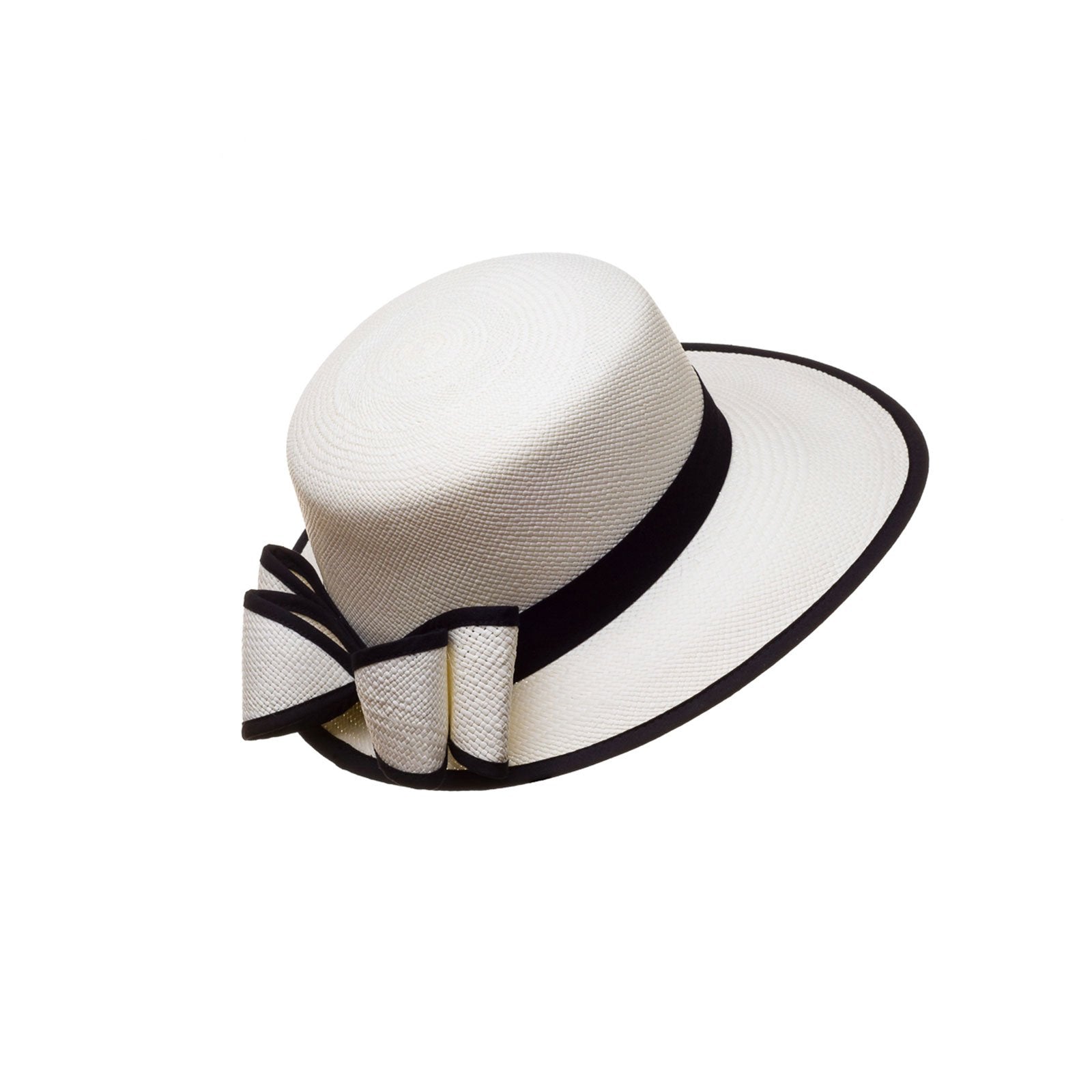 “La Visera” is a classic elegant hat for all women. Handmade out of natural Toquilla Palm Tree. A exclusive design from El Galpón this beautiful hat comes in tree colors to choose. We ship to all US states and PR. Handmade hats made in Ecuador dreamed in Puerto Rico. Shop online!