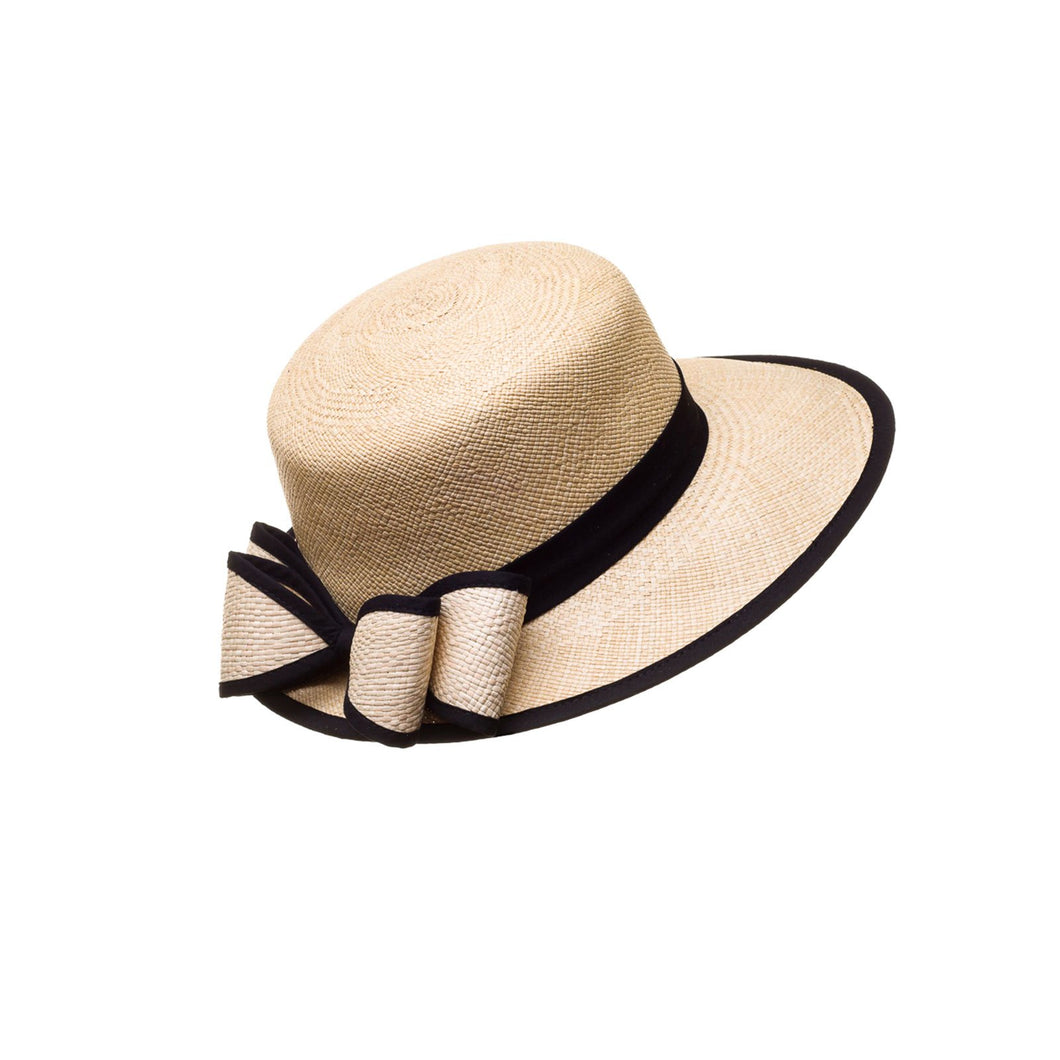 “La Visera” is a classic elegant hat for all women. Handmade out of natural Toquilla Palm Tree. A exclusive design from El Galpón this beautiful hat comes in tree colors to choose. We ship to all US states and PR.  Handmade hats made in Ecuador dreamed in Puerto Rico. Shop online! 